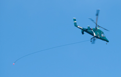 24 May 2015 A new chopper heading for
                            Lake Mendocino to get water. Maybe an Apache
                            AH64 modified for fire duty?