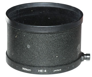 Nikon HE-4
                    Lens Hood (1986 -2005 version of the MF 300mm f/2.8
                    Lens)