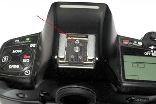 Nikon
                hot-shoe socket for locking pin